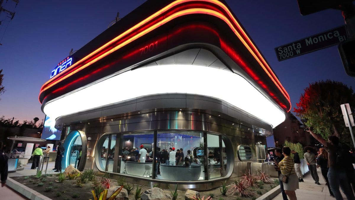 Crowd outside Tesla Diner at twilight