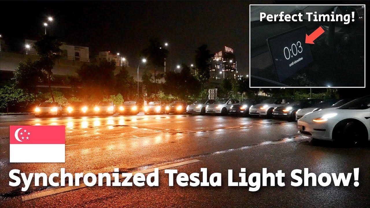 Synchronized Tesla light show lineup at night